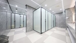 A modern, well-lit office space with glass partitions, a checkered floor, and a clean, minimalist design. - Lemon Hotel-Hangzhou West Lake (Hangzhou)