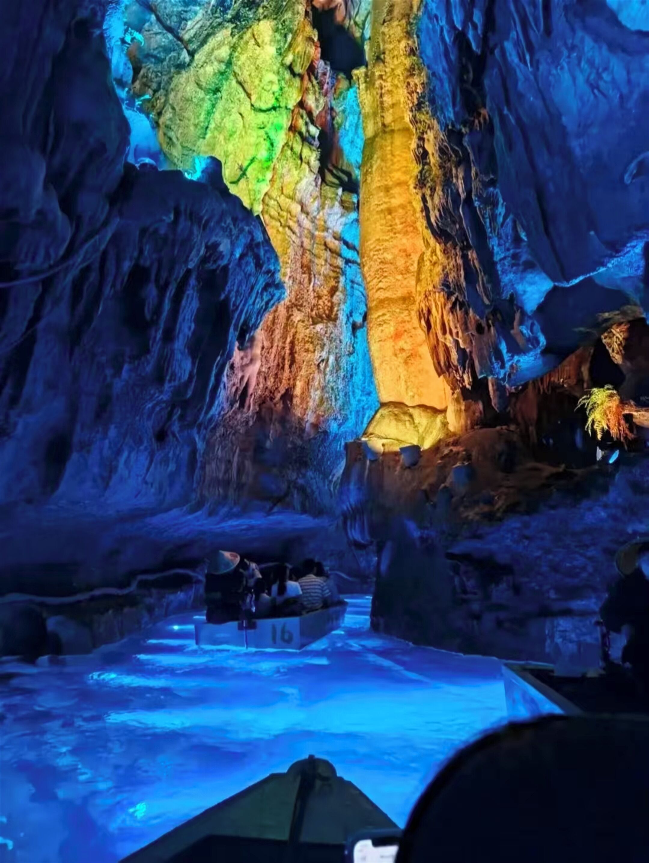 An indoor cave-like environment with a boat ride.