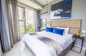 1 bedroom, iron/ironing board, bed sheets - The Capital on the Park-Studio Apartment (Sandton)