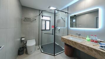 Eco-friendly toiletries, hair dryer, towels, soap