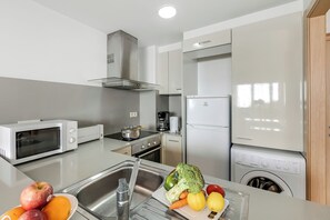 Căn hộ Tiêu chuẩn, nhiều phòng ngủ (El Tarter Ski Apartment for Families) | Bếp riêng | Tủ lạnh, lò vi sóng, lò nướng, bếp nấu 