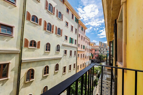 Family Room, Balcony, City View | Desk, laptop workspace, free WiFi
