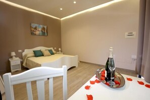 1 habitación, tabla de planchar con plancha, wifi gratis y ropa de cama 