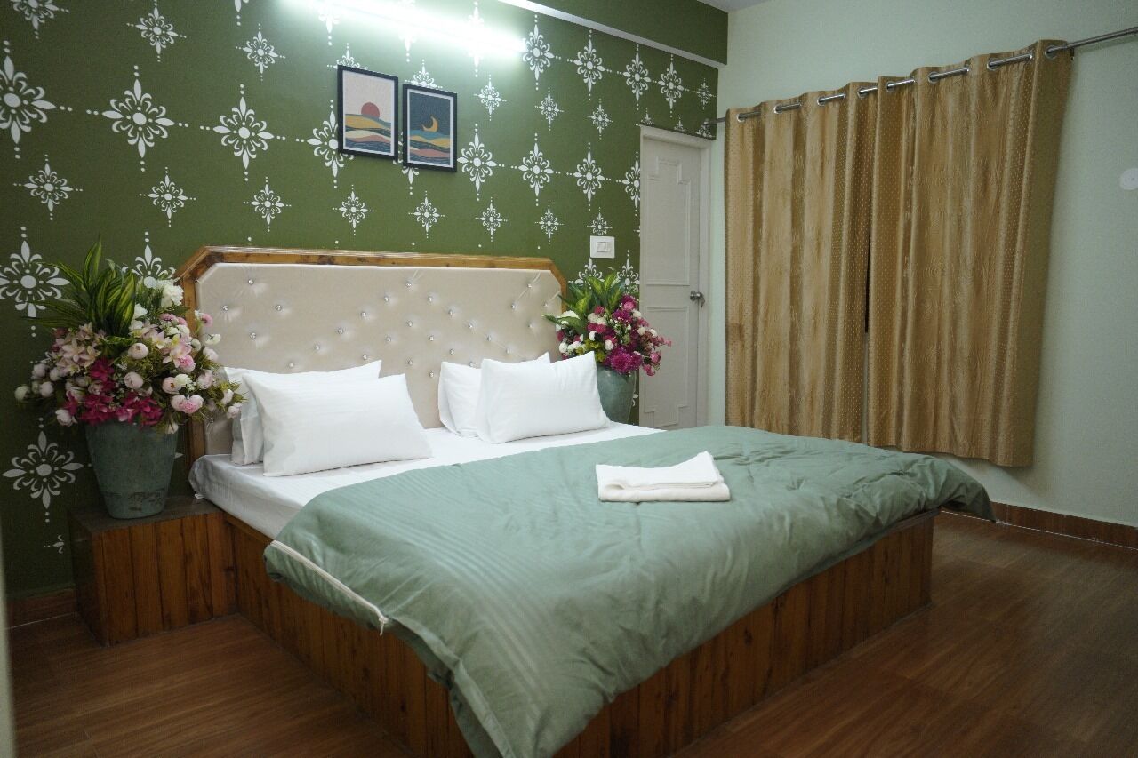 Kamar Double Deluks, pemandangan gunung | Seprai premium, minibar, Wi-Fi gratis, dan seprai linen