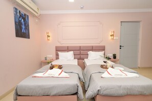 Deluxe Twin Room, Balcony, City View | Individually decorated, individually furnished, desk, laptop workspace - Miraya Inn (Pune)