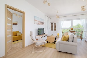Apartment, 1 Bedroom, Balcony, Lakeside | Living area - Apartment With Pond View by Renters (Katowice)