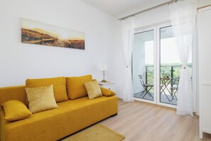 Apartment, 1 Bedroom, Balcony, Lakeside | 1 bedroom, individually decorated, desk, laptop workspace