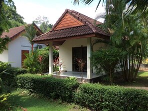 A small, single-story house with a tiled roof and a porch. - Cousin Resort Khao Lak (Takua Pa)