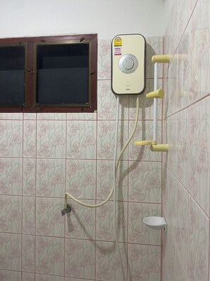 A bathroom with a shower unit, a window, and a sink. - Cousin Resort Khao Lak (Takua Pa)