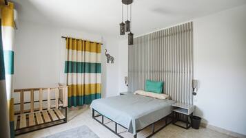 Apartemen Keluarga, Bebas Asap Rokok, pemandangan kota | 3 kamar tidur, seprai premium, dan tempat tidur bayi gratis