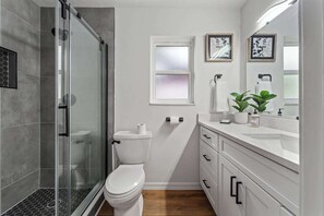 Shower, hair dryer, towels