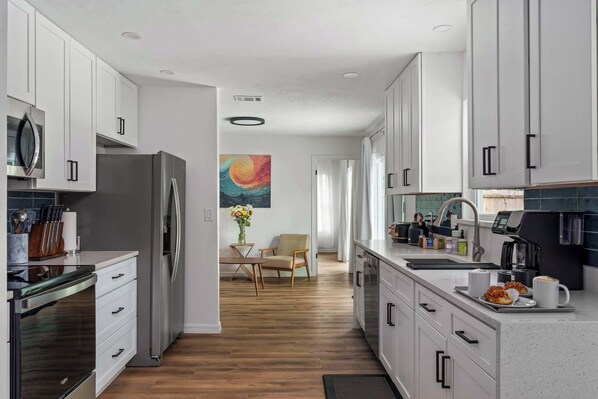 Fridge, microwave, oven, stovetop - The Monterey | Private Pool • Grill • 4 King Beds (Gainesville)
