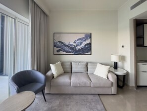 Royal Apartment | Living area | 45-inch Smart TV with satellite channels - Apartments at Address Beach Marassi By Bird Nest (El Alamein)