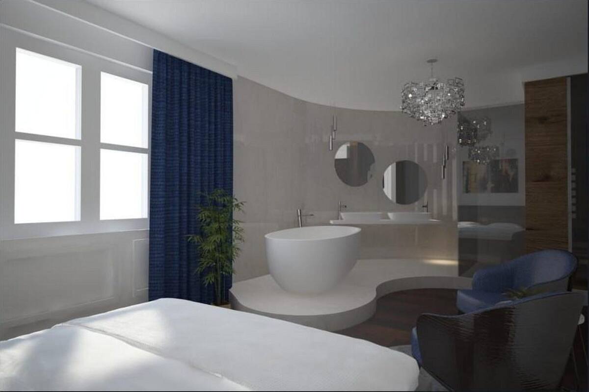 Suite Deluxe, planta baja | 1 habitación, caja de seguridad en la habitación y escritorio