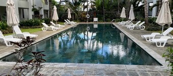 Charming 3-bedroom beachfront villa with WiFi, gym, pool & garden