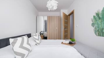 Apartment, 1 Bedroom, Balcony | 1 bedroom, individually decorated, laptop workspace, bed sheets