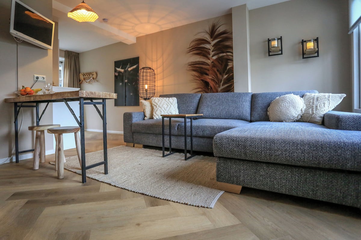 Suite de lujo, junto a la playa | Área de sala de estar