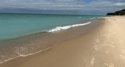 Relaxing Family Vacation Home Steps from Lake Michigan Beaches, Golf, and Fun.