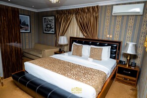 In-room safe, desk, laptop workspace, iron/ironing board - NO.1 Hotel and conference Ltd (Abuja)