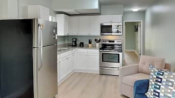 Condo, 1 King Bed with Sofa bed, Patio, Garden View (PC Beach Retreat A - No Pets Allowed) | Private kitchen | Fridge, microwave, oven, stovetop