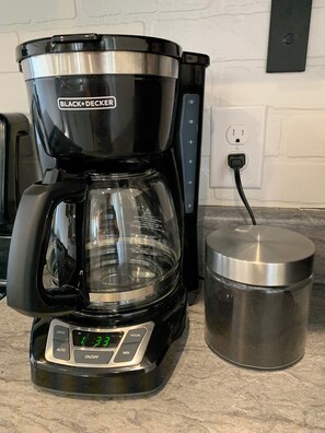 A BLACK+DECKER coffee maker with a digital clock, a glass carafe, and a stainless steel pot. - Affordable Luxury / Quiet / 2 min to Erskine College & The Renaissance (Donalds)