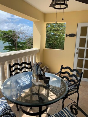 Outdoor dining - 4-bedroom Beachfront Condo in Rincón w/ most Spectacular Sunsets in Puerto Rico (Rincón)