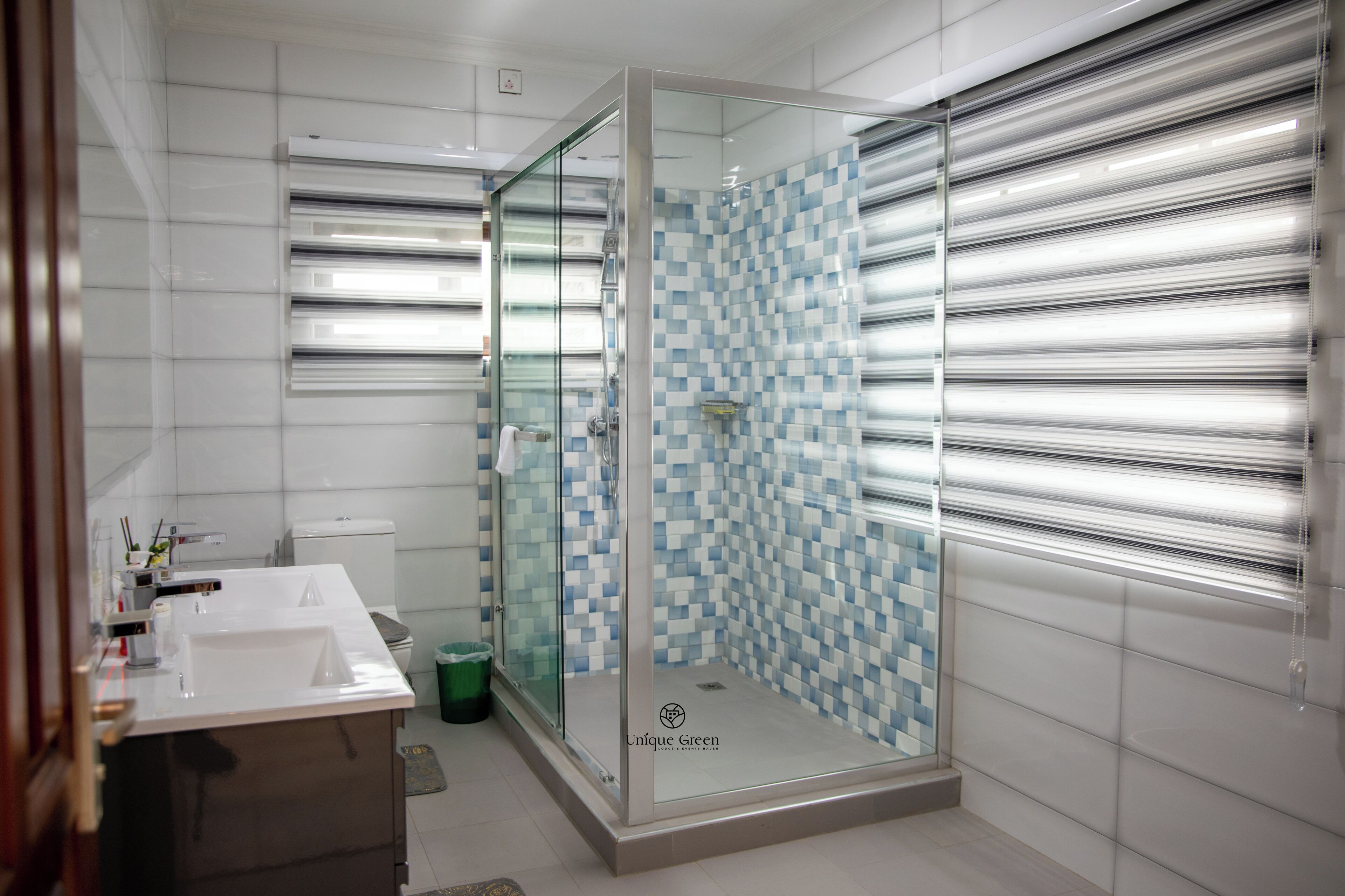 Shower, towels, soap, toilet paper