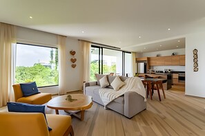 Comfort Apartment | Living area | 50-inch Smart TV with digital channels - oasis yaaxlum (Tulum)