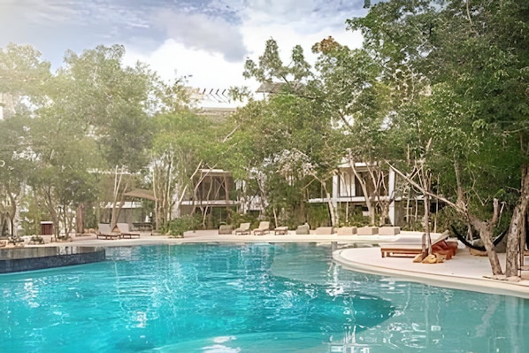 Outdoor pool, open 9:00 AM to 10:00 PM, free cabanas, pool umbrellas