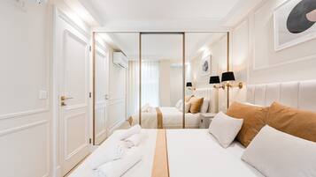 1 dormitorio, tabla de planchar con plancha, Internet y ropa de cama