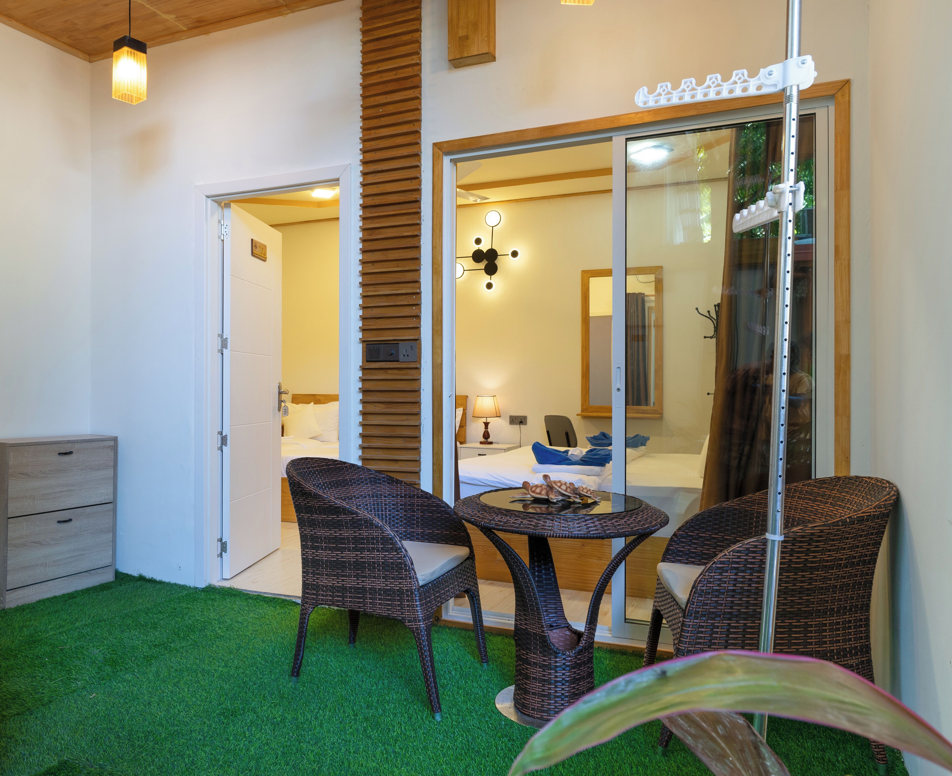 Habitación cuádruple familiar, patio, vista al jardín | Terraza o patio