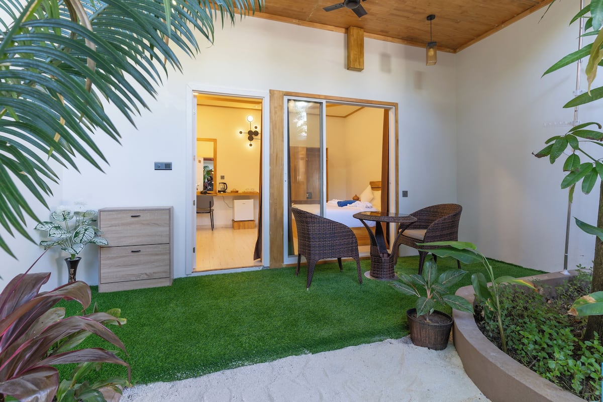 Deluxe tweepersoonskamer, patio, uitzicht op tuin | Terras