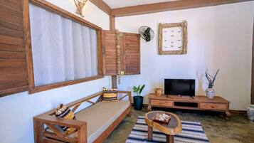 Appartement Confort, vue jardin | Coin séjour