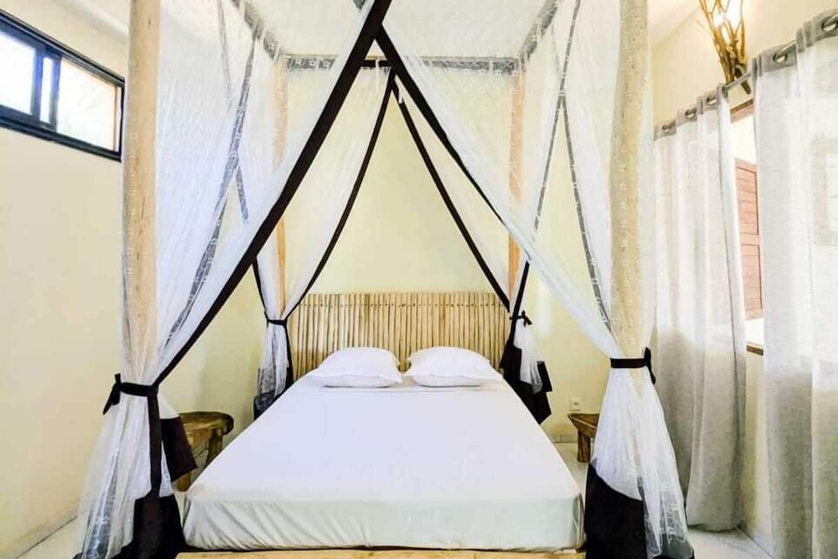 Departamento Confort, vista al jardín | Caja de seguridad en la habitación y wifi gratis