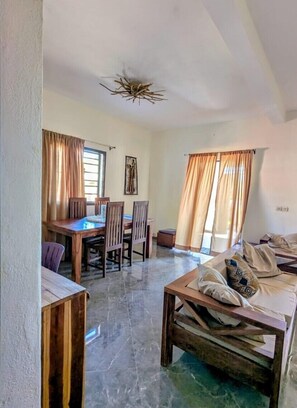 Apartamento Confort, vistas al jardín | Zona de estar