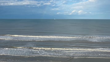 On the beach, sun loungers, beach towels