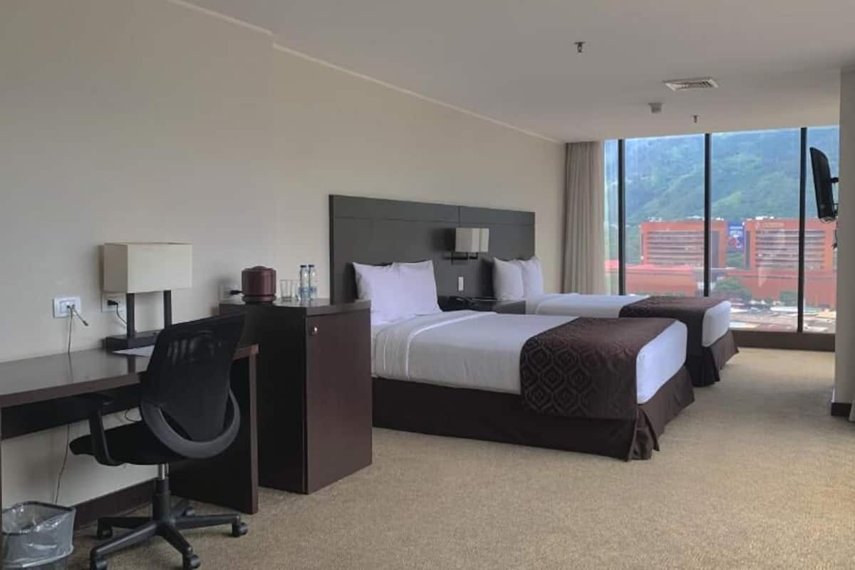 Deluxe Room | In-room safe, desk, laptop workspace, iron/ironing board