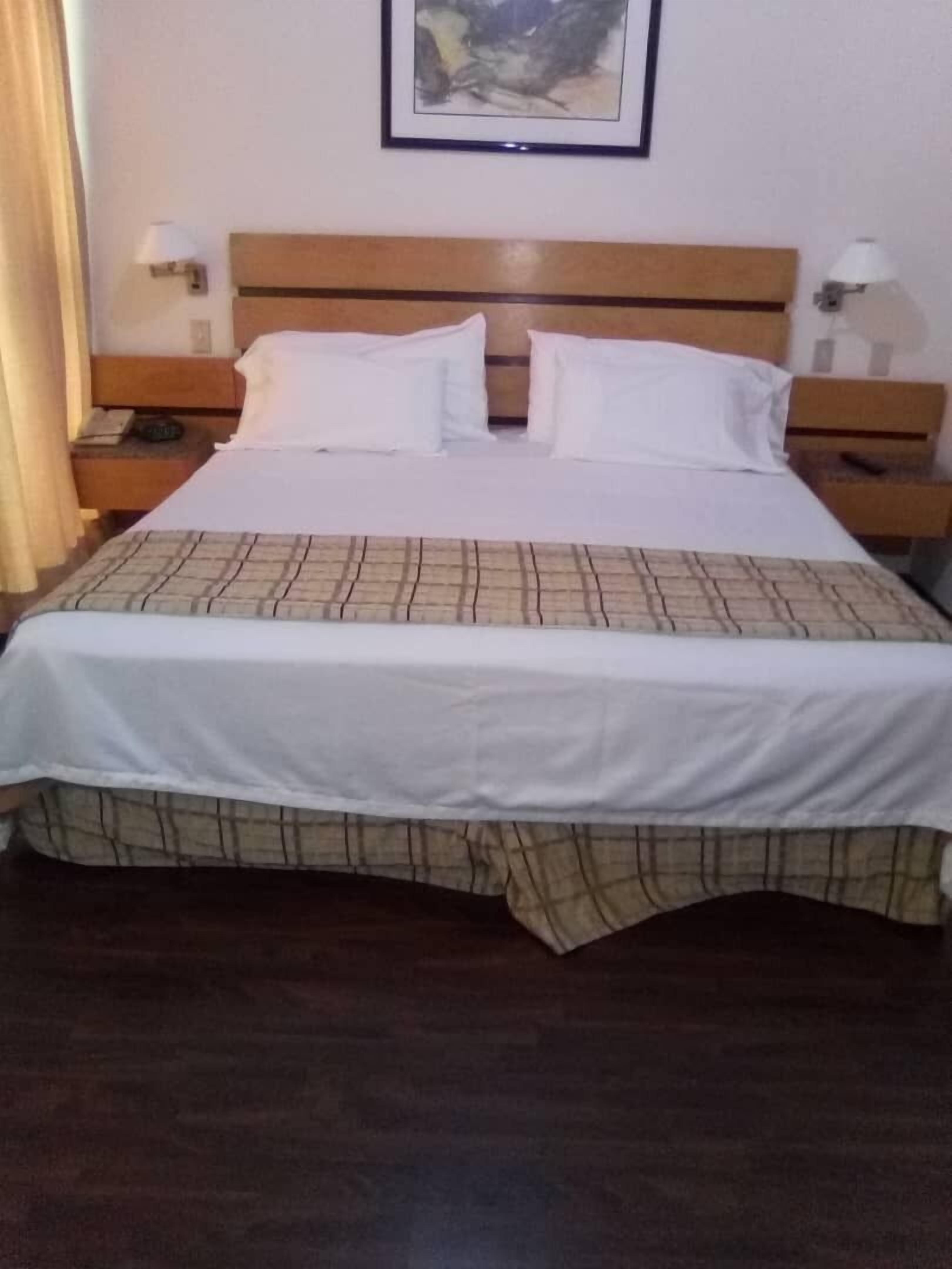 Habitación doble Confort | Ropa de cama de alta calidad y caja de seguridad en la habitación 