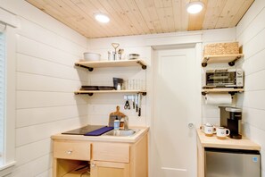 Fridge, coffee/tea maker, toaster, cookware/dishes/utensils