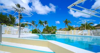 Palm Place 2-bedroom condo in Frigate Bay with WiFi, AC, close to all amenities