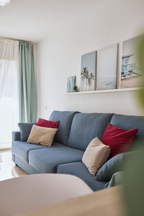 Living area - Bright Sunny Albir Beach Apartment with AC, WiFi, and parking (Albir)