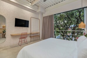 Deluxe Room, Balcony | In-room safe, desk, laptop workspace, blackout drapes