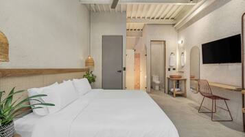 Deluxe Room, Balcony | In-room safe, desk, laptop workspace, blackout drapes