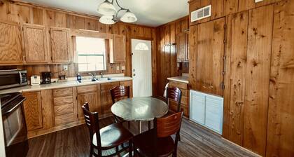 Peaceful cabin in orchard with Lake Chicot views!