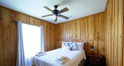 Cottage tucked in back of orchard with full kitchen and lake access!
