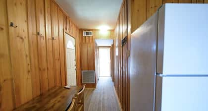 Cottage tucked in back of orchard with full kitchen and lake access!
