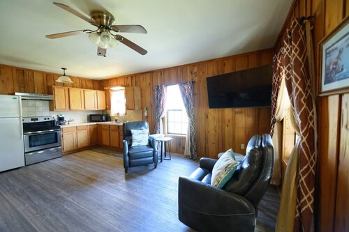 Cottage tucked in back of orchard with full kitchen and lake access!