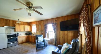 Cottage tucked in back of orchard with full kitchen and lake access!