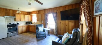 Cottage tucked in back of orchard with full kitchen and lake access!