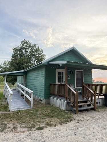 Cottage tucked in back of orchard with full kitchen and lake access!